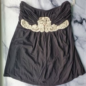 black strapless top with crochet detail